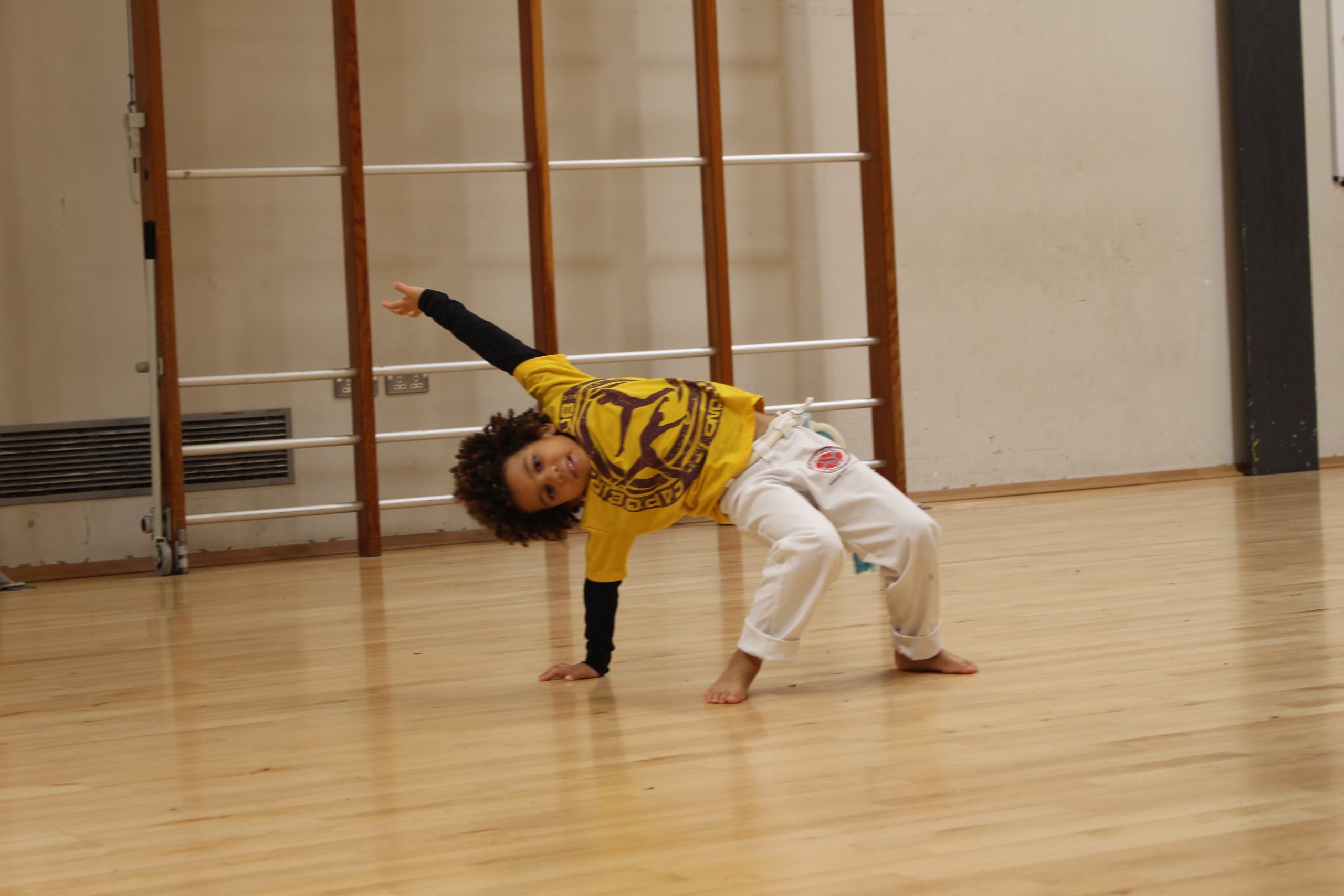 Kids capoeira class in movement at The Limes Centre, Chigwell